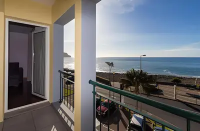 a balcony with a view of the ocean at Praia Mar (sea view) by STAY Madeira Island in Ponta do Sol