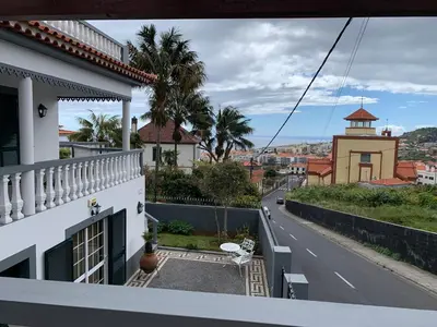a view from the balcony of a house at Funchal Apt- Sleeps 2 - Pool & Parking - Madeira in Funchal