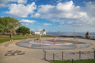a park with a clock in the middle of the water at Rodamar II by An Island Apart in Funchal