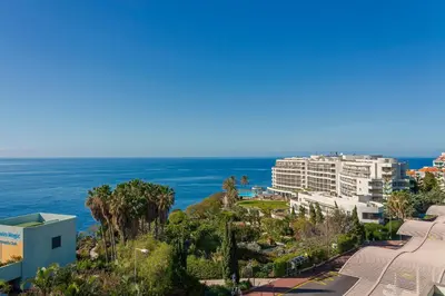 a view of a city with the ocean in the background at Rodamar II by An Island Apart in Funchal