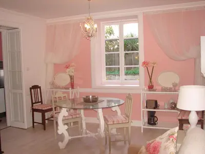 a dining room with a table and chairs at Private Pool Apt. with Great View in Funchal