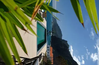 a building with a television on the side of it at Casa Del Mar- Wonderfull Sea Views & Swimming Pool in Ponta Delgada