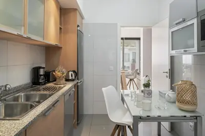 a kitchen with a sink and a counter top at Amparo Delight by Homie in Funchal