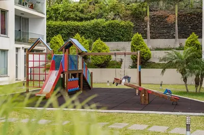 a playground in a park with a slide at Amparo Delight by Homie in Funchal