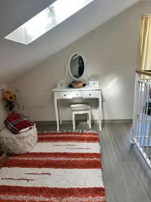 a room with a dressing table and a mirror at Lovely newly refurbished, 1 bedroom top floor apartment with sea views, fast WI-FI CABLE TV and Netflix in Ribeira Brava