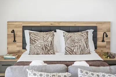a bedroom with a large bed with two pillows at Fenix Ocean View by Homie in Funchal