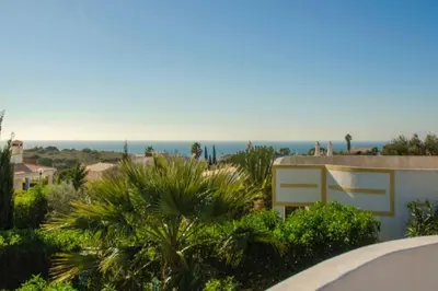 a view of the ocean from a house at Spacious 3 bedroom villa with pool in Luz