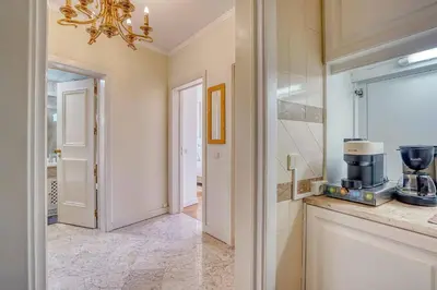 a kitchen with a coffee maker on a counter at Madeira Inn Group in Funchal