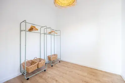 a room with three glass shelves with baskets on it at Fortaleza sea view Villa Miramar - Apartment with private pool in Budens