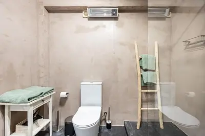 a small bathroom with a toilet and a sink at Fortaleza sea view Villa Miramar - Downstairs Apartment II in Burgau