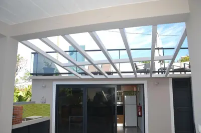 a glass roof on top of a building at Casa d' Avó Zeza in Jardim do Mar