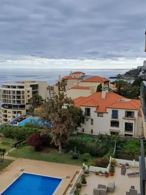 an aerial view of a resort with a swimming pool at Ocean at your feet! in Funchal