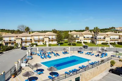 an image of a swimming pool at a resort at WOW Flat, Birdie, Golf, Spa & Swimming Pool (WIFI) in Lagos