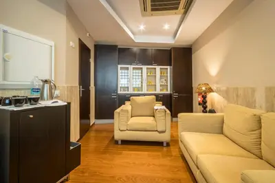 a living room with a couch and a chair at Estrela da Praia da Luz - 2 Bedroom Sea View Apartment in Luz