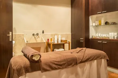 a spa room with a bed with a mask on it at Estrela da Praia da Luz - 2 Bedroom Sea View Apartment in Luz