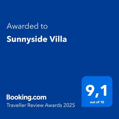 a blue screen with the text awarded to sunriseisel villa at Sunnyside Villa in Arco da Calheta