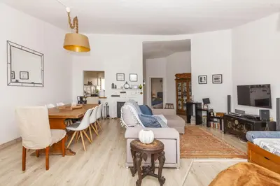 a living room with a couch and a table at C18 - Church Square Apartment in Praia da Luz in Luz