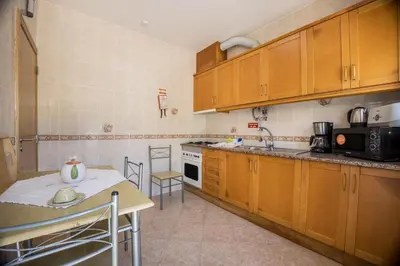 a bathroom with a sink and a toilet at Casa Fernandes in Burgau