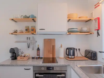 a kitchen with a sink and a counter top at Ao Sabor do Vento (+12 ) in Aljezur