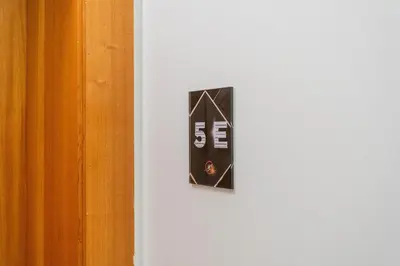 a lightswitch on a white wall in a room at FLH Funchal Studio with Balcony in Funchal