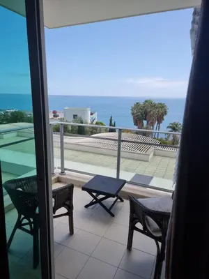 a balcony with a view of the ocean at Magical Seaview (Free Parking) in Funchal