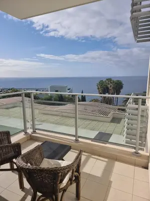 a balcony with a view of the ocean at Magical Seaview (Free Parking) in Funchal