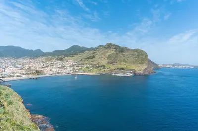 an island in the ocean with a town and a city at Avelino Apartment by Atlantic Holiday in Machico