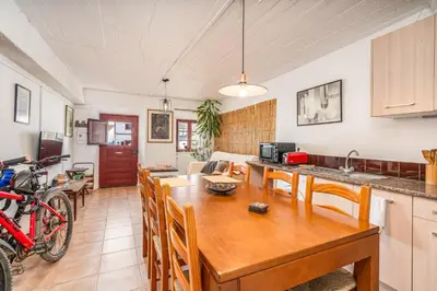a living room with a couch and a table at Casa da Praia 2 in Budens