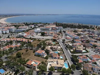 an aerial view of a city and the ocean at 202 Lagood in Lagos