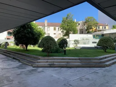 a view of a park with trees and buildings at Madeira, 3 bedroom apartment with ocean views in Funchal in Funchal