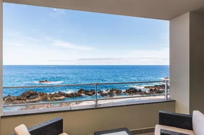 a room with a view of the ocean at Aqua Natura Madeira in Porto Moniz