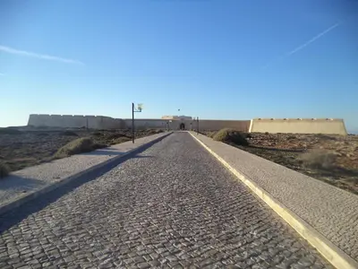 an empty road in the middle of the desert at Cool Villas T2 in Sagres