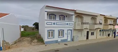 a building on the side of a street at Cool Villas T4 in Sagres