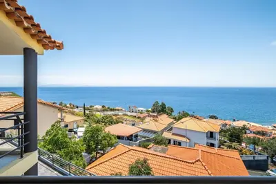 a view of the ocean from a house at The Balcony - By Wehost in Santa Cruz