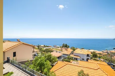 a view of the ocean from a house at The Balcony - By Wehost in Santa Cruz