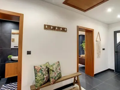 a living room with a bench in a room at Quinta do Conde by LovelyStay in Boaventura