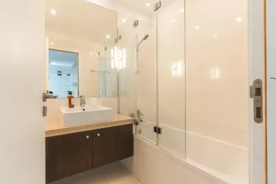 a bathroom with a sink and a shower at Terrace Apartment by Atlantic Holiday in Funchal