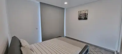 a room with a bed and a picture on the wall at Villa Castanho I in Calheta