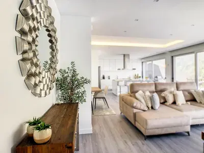 a living room with a couch and a table at Wild River Villa by LovelyStay in Ribeira Brava