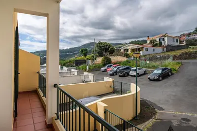 a balcony with a view of a parking lot at Strategic Sunset House by An Island Apart in Santa Cruz