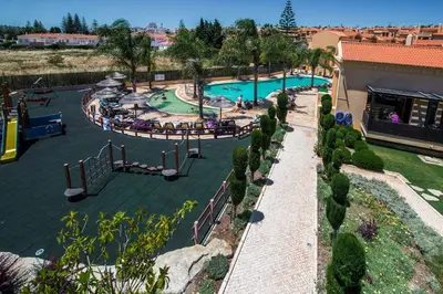 an overhead view of a swimming pool at a resort at Sunny Retreat in Luz