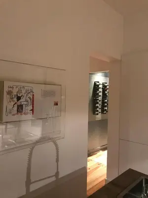 a display case in a room with a wine rack at City center boutique apartment in Funchal