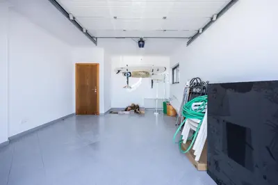 an empty room with a hallway with a room with a room at Pontalaia Village in Sagres