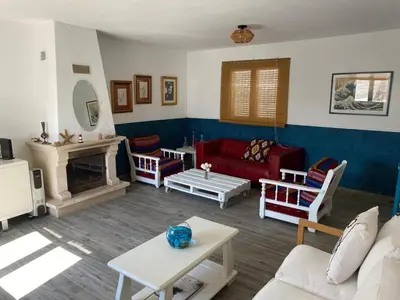 a collage of four pictures of a bedroom and a bathroom at Casa La Isla in Sagres