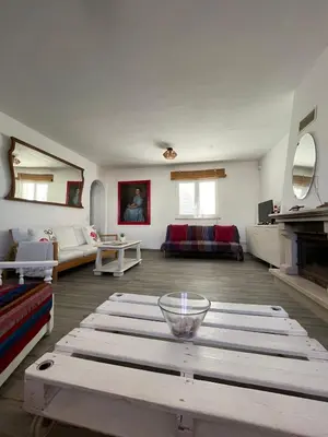 a bathroom with a sink and a glass wall at Casa La Isla in Sagres