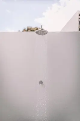 a shower with a spider in the middle of it at QUINTA TORRINHA GARDEN Apartment in Funchal