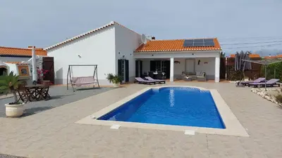 an outdoor grill with a bunch of food on it at Villa Atlantico in Aljezur