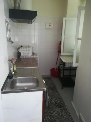 a kitchen with a sink and a counter top at Cc39-Q4 in Funchal