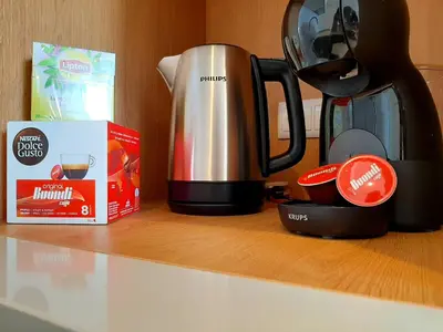 a coffee maker and a box on a counter at Superb Sea View Flat in Funchal in Funchal