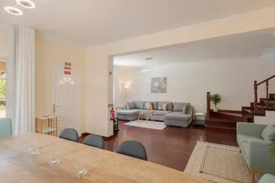 a living room with a couch and a table at Vila Boa Vista by An Island Apart in Funchal